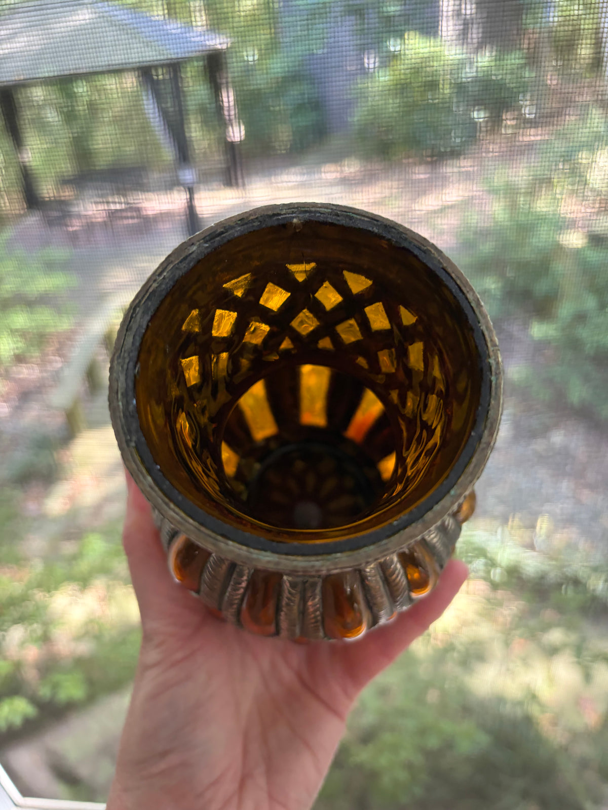 Lovely amber bubble glass vase encased in metal!