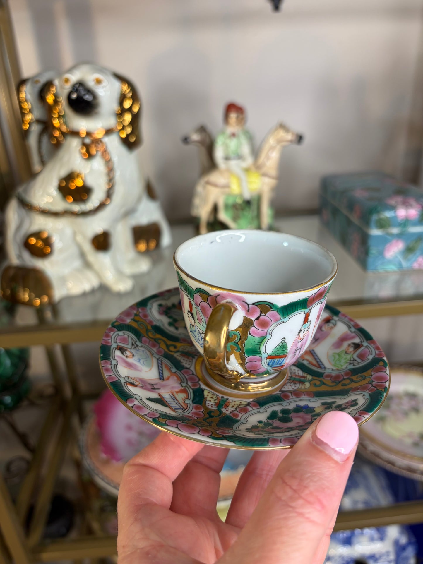 Famille Rose teacup and saucer handpainted featuring birds!