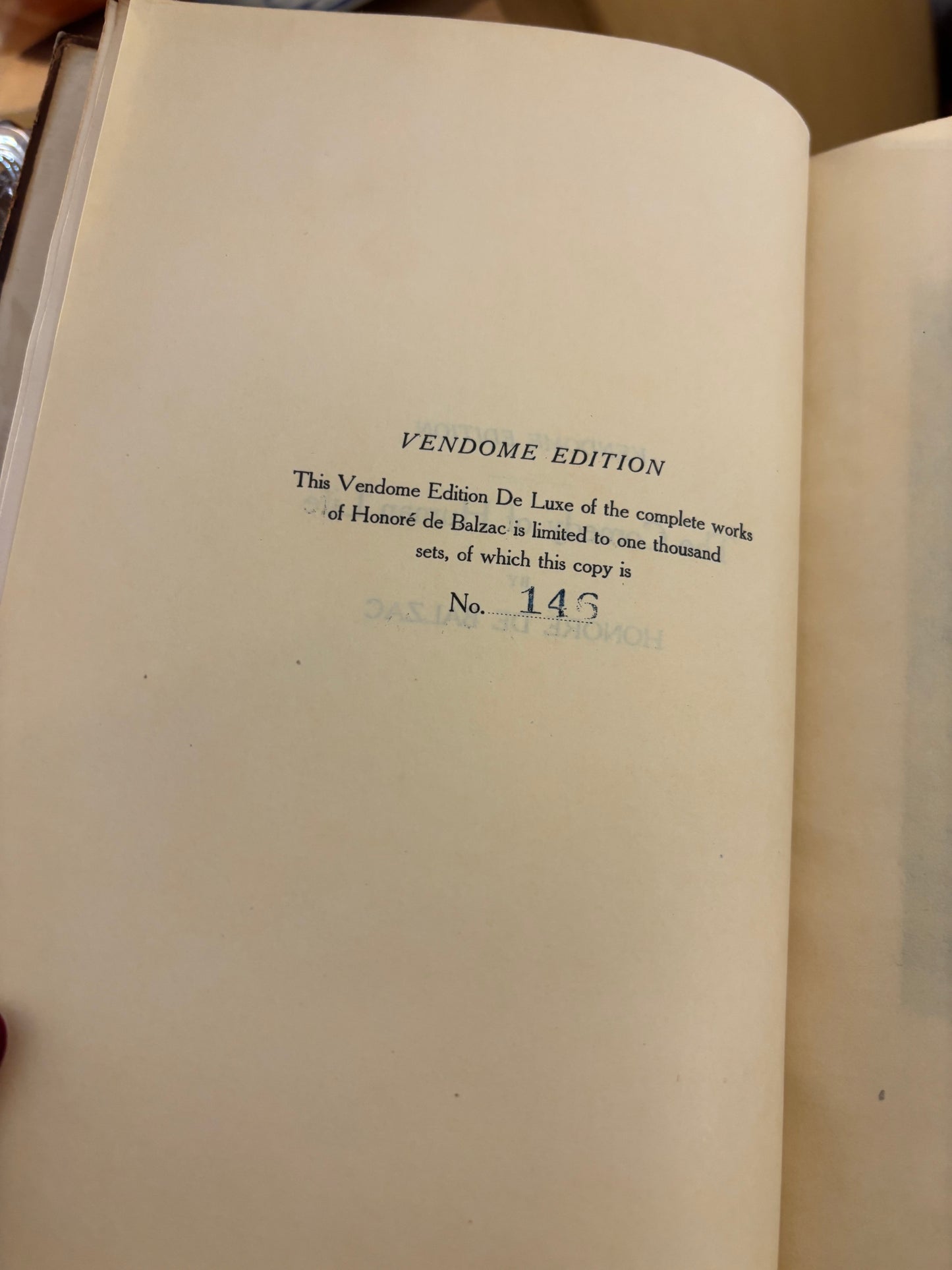 Stunning antique leather-bound volumes of the works of Honoré de Balzac, specifically Volume XXII, Cousin Pons, and Volume XXIX, The Chouans!