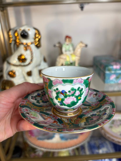 Famille Rose teacup and saucer handpainted featuring birds!
