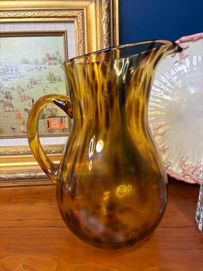 Lovely tortoise shell style glass pitcher!