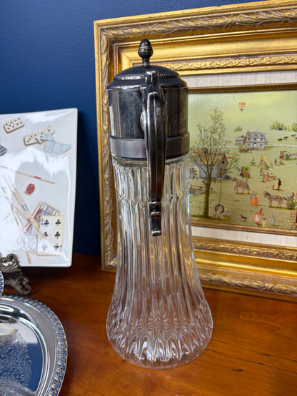 Vintage carafe cut glass pitcher with silver top!