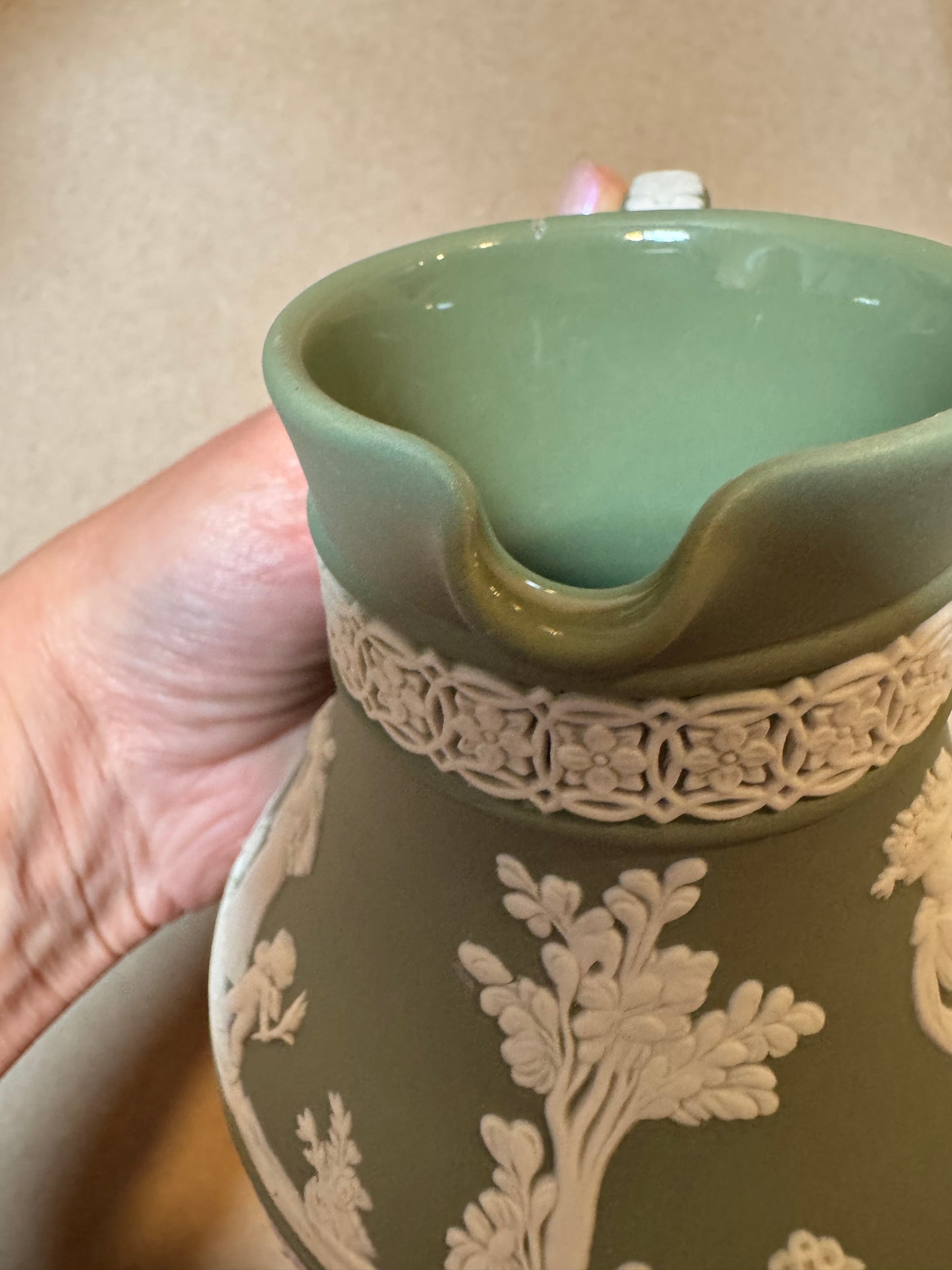 Live 06/15 sage green Wedgwood pitcher has repair