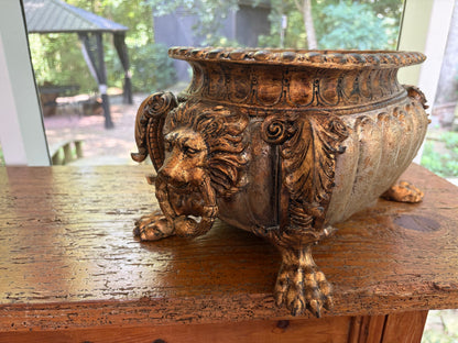 Striking composite lion head and claw feet footbath planter!