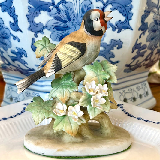 Collectible vintage porcelain bird figurines by designer Royal Crown
Baltimore Oriole #KW465