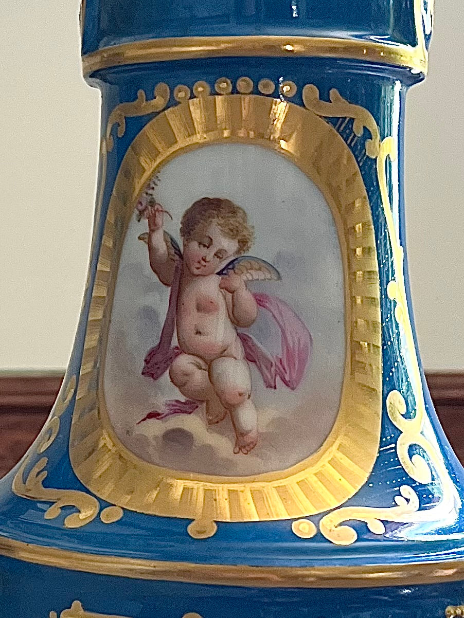 Elegant Pair of Antique 19th Century French Sèvres Style Porcelain Vases In Céleste Bleu With Hand-Painted Putti And Florals