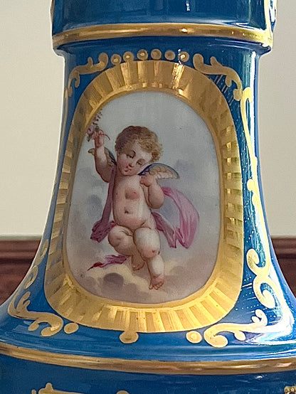 Elegant Pair of Antique 19th Century French Sèvres Style Porcelain Vases In Céleste Bleu With Hand-Painted Putti And Florals