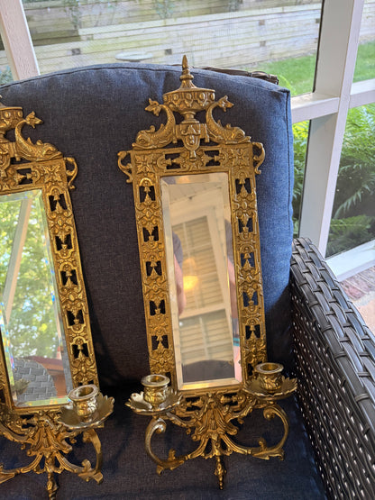 Stunning mirrored brass sconces pair with koi fish, ornate details, and tassel design!