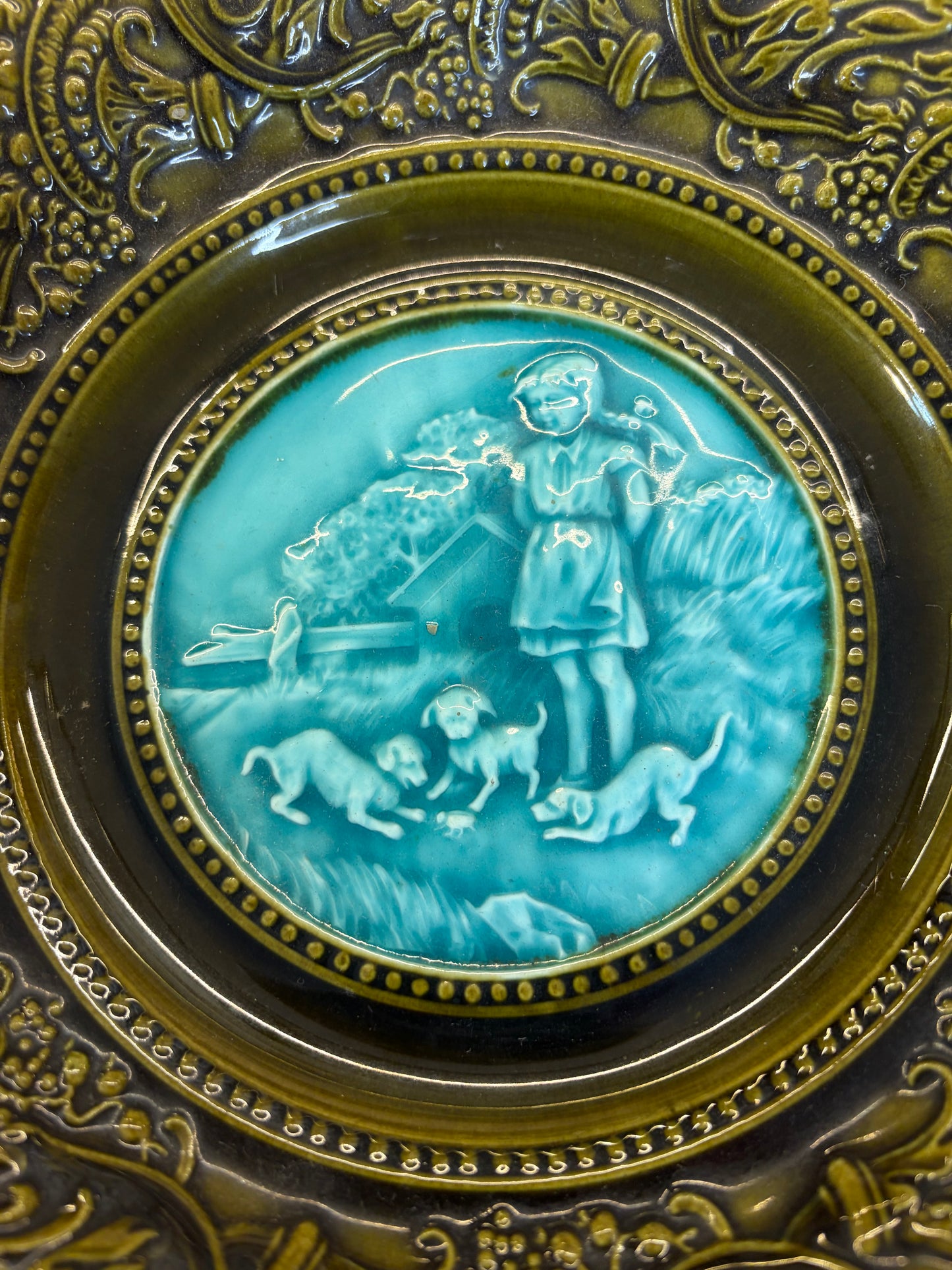 Gorgeous majolica compote featuring a girl and dogs!