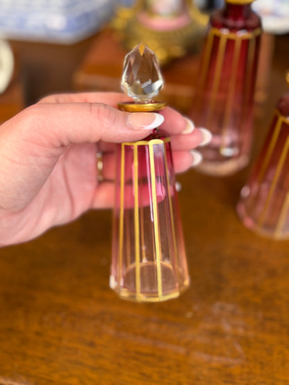 Set of 3 Cranberry Cut Crystal Perfume Bottles with Gilt Detail & Faceted Stoppers, c. 1930s–50s (8.5”, 6.5”, 6”)