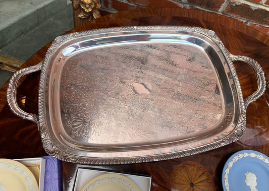 Beautiful FB Rogers Silverplated tray with feet and ornate edges!