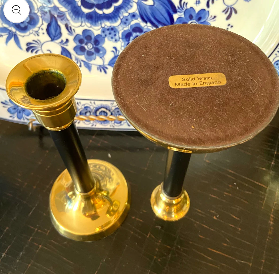 Pair of English shiny brass and ebony black vintage candlestick holders