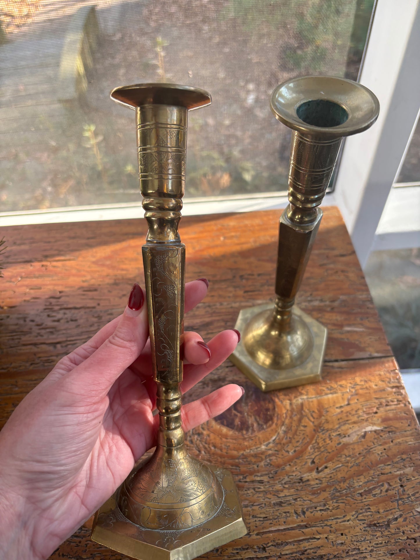 Beautiful pair of etched floral and leaves brass candlesticks!