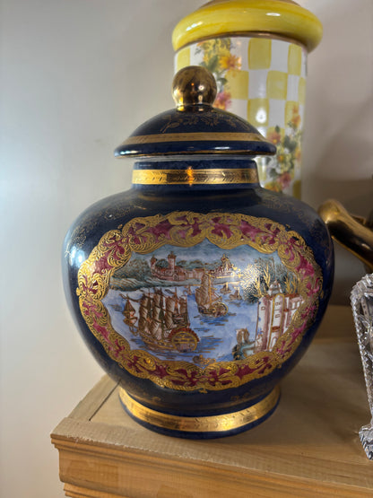 Cobalt lidded jar featuring ship scenes and gold details!