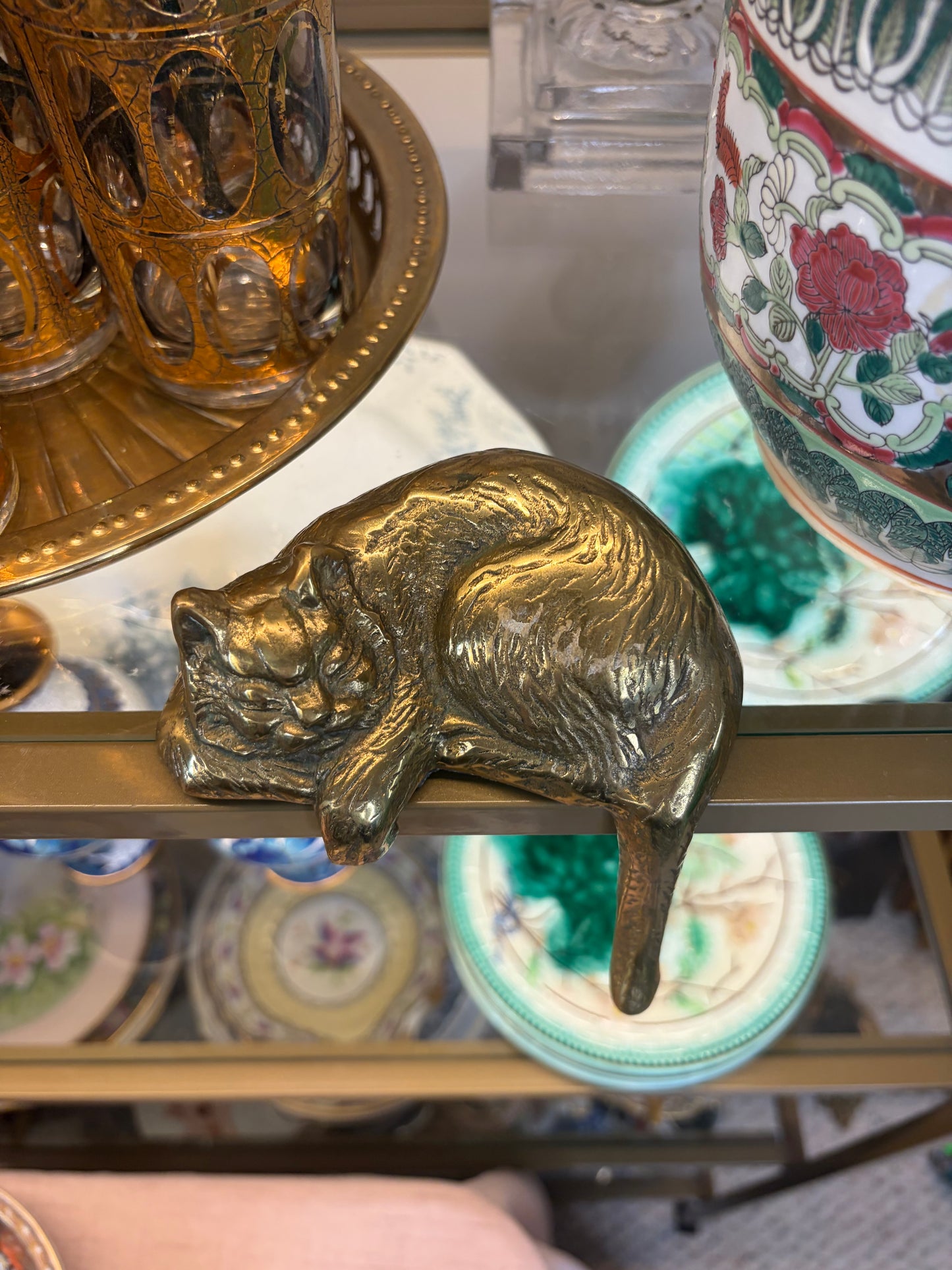 Vintage brass sleeping cat on shelf!