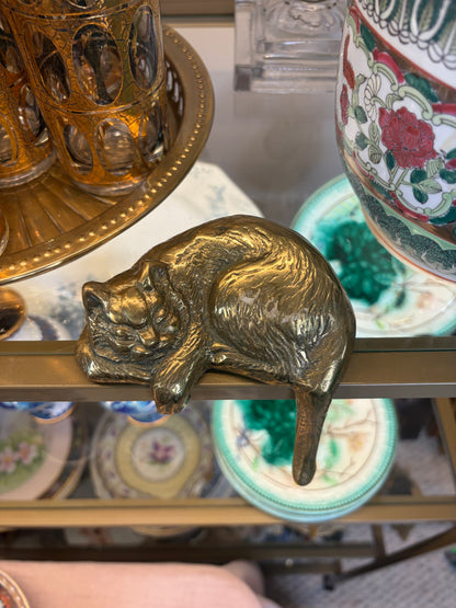 Vintage brass sleeping cat on shelf!
