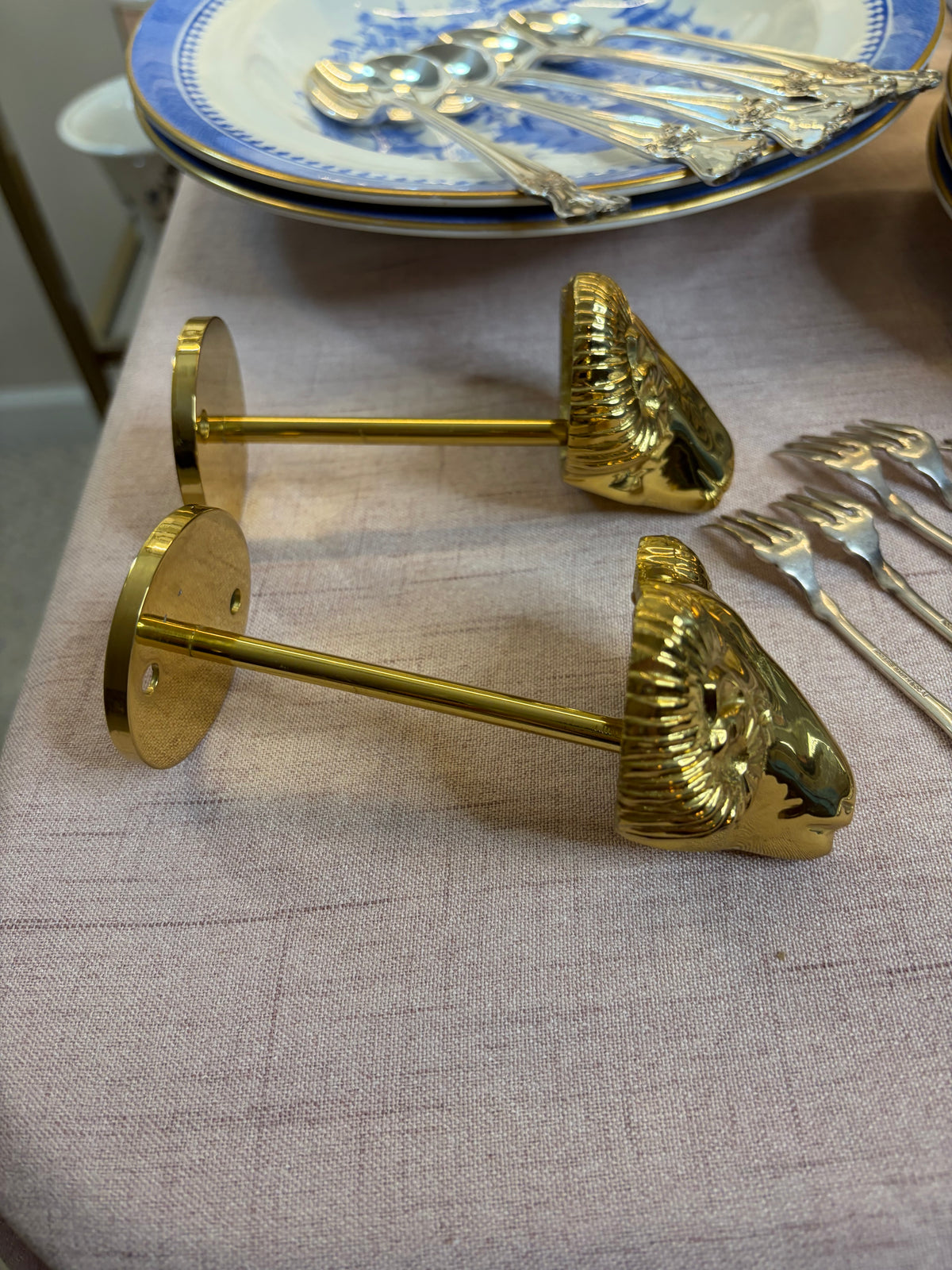 Lovely brass ram’s head brass curtain tie backs!