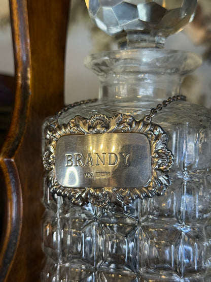 Antique English Oak Three-Bottle Tantalus W/ Cut Crystal Decanters, Sterling Silver Labels & Original Key, c.1900, 15” W x 13” H x 6.5” D