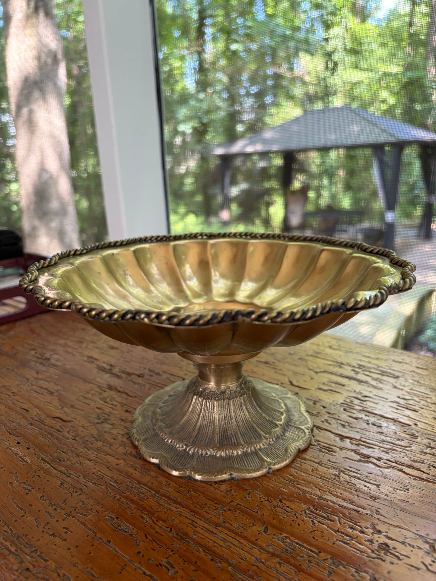 Beautiful brass scalloped pedestal bowl with rope design and intricate base!
