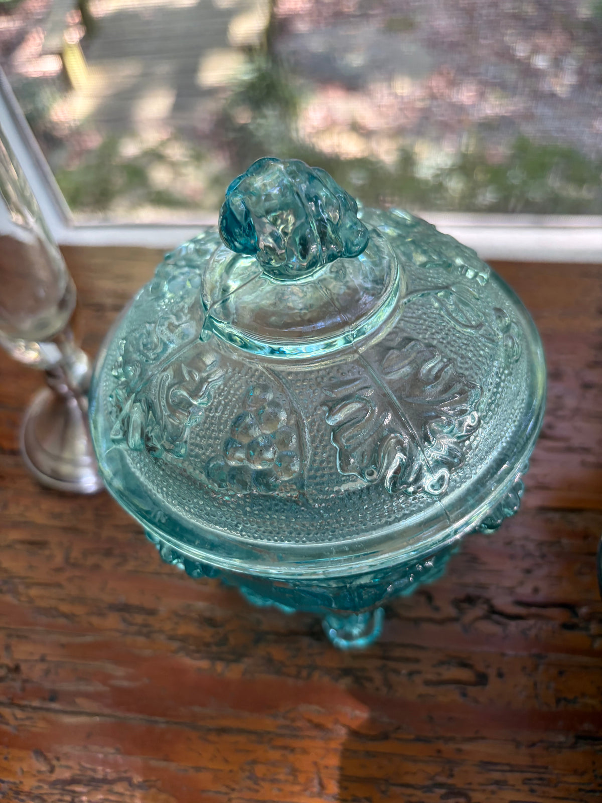 Beautiful Jeanette Glass lidded teal dish with leaf design and grape finial!