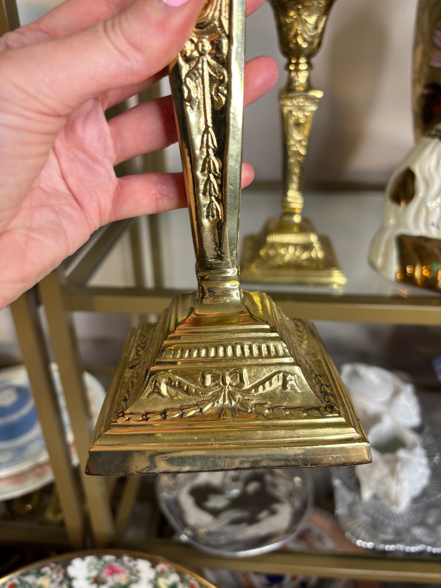 Beautiful brass candleholders pair featuring bows and ribbon designs!