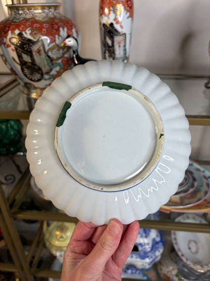 Lovely handpainted bird plate with scalloped edges and pink flowers!
