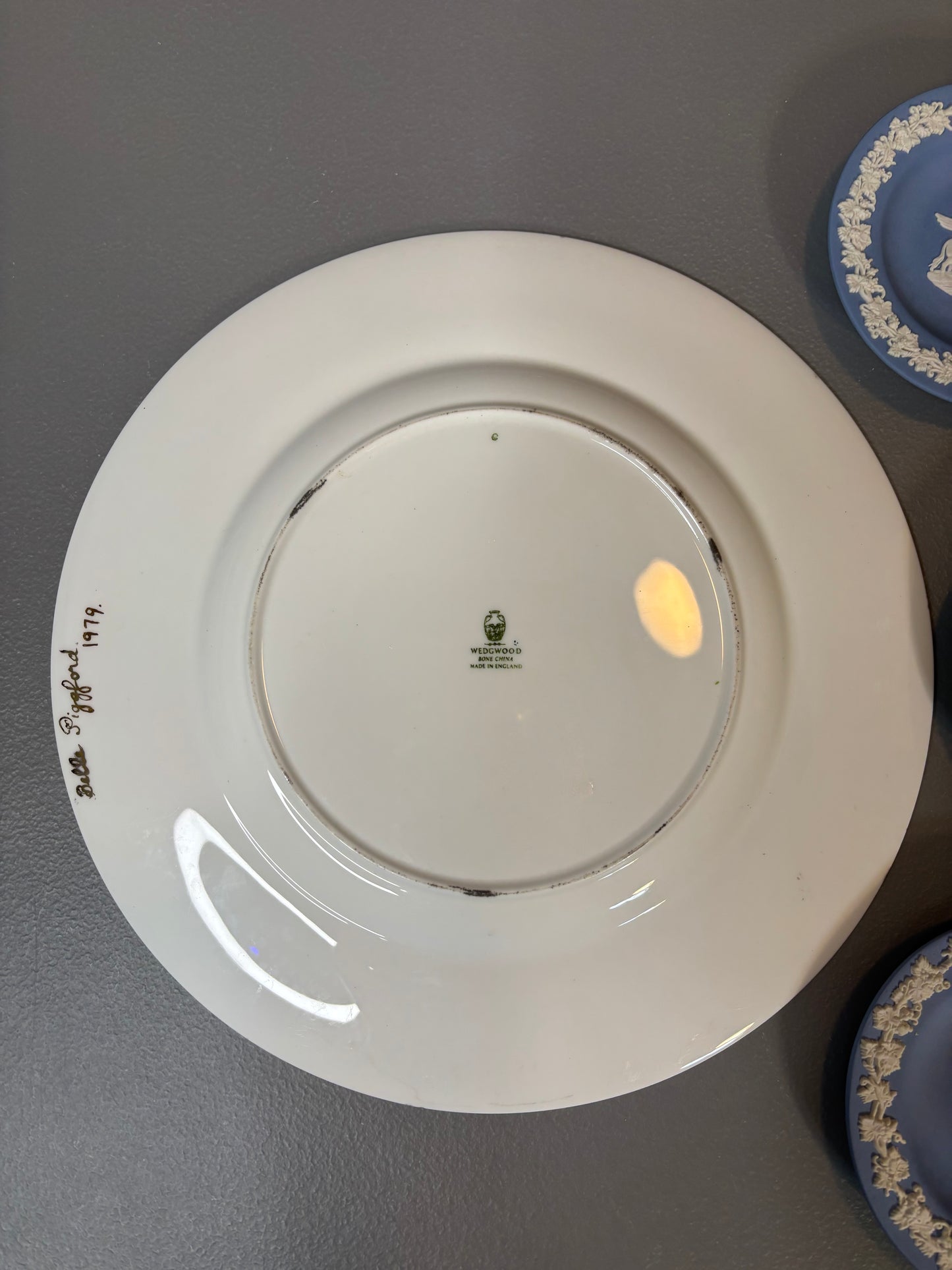 Instant plate wall! Features a handpainted floral plate signed and 3 Wedgwood trinket dishes!