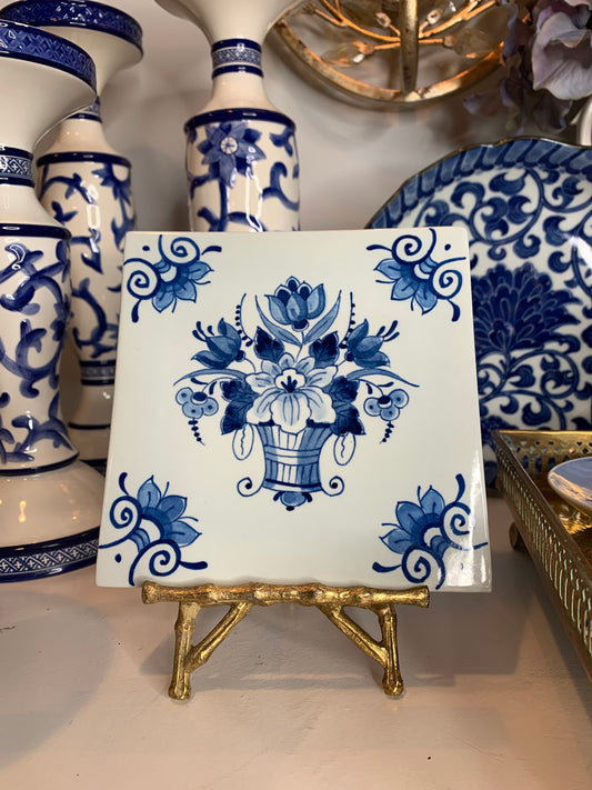 Blue flower basket painted on white porcelain
