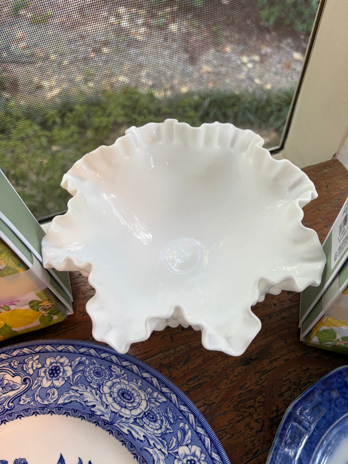 Beautiful white milk glass footed, ruffled hobnail bowl!