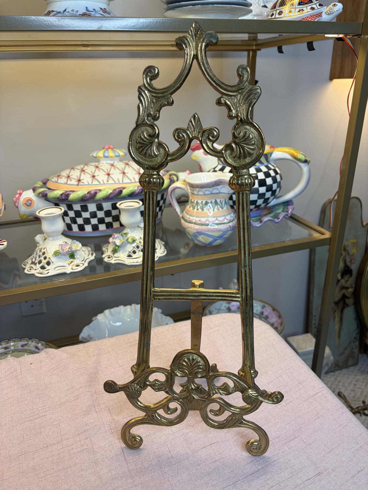 Ornate brass easel with shell motifs!