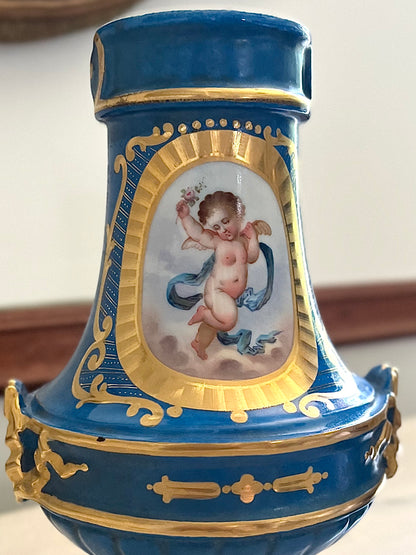 Elegant Pair of Antique 19th Century French Sèvres Style Porcelain Vases In Céleste Bleu With Hand-Painted Putti And Florals