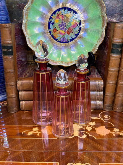Antique Set (3) Pink Cut Crystal Perfume Bottles with Gilt Detail & Faceted Stoppers, c. 1930s