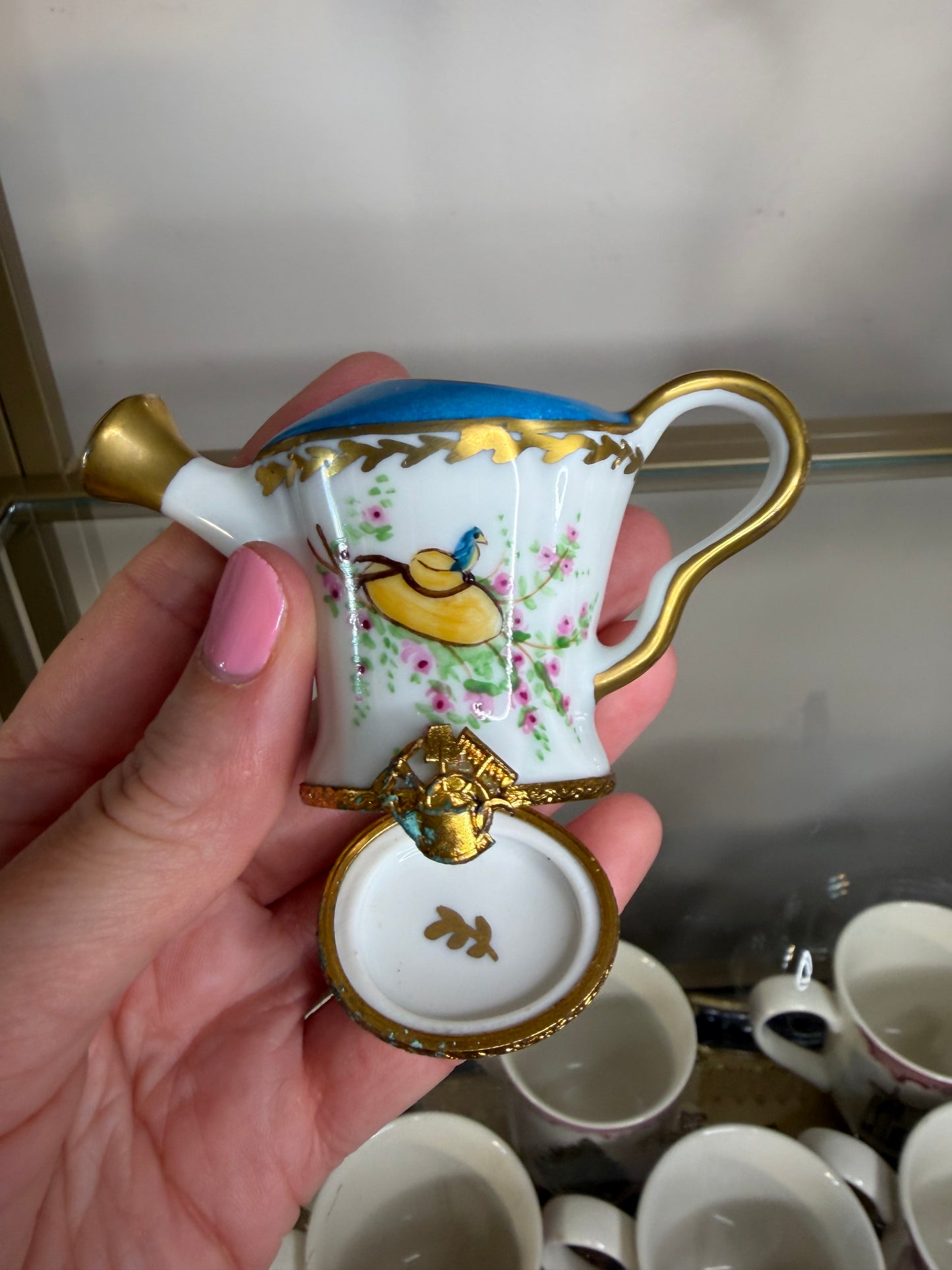 Sweetest handpainted Limoges porcelain watering can trinket box featuring a delicate bird and floral design!
