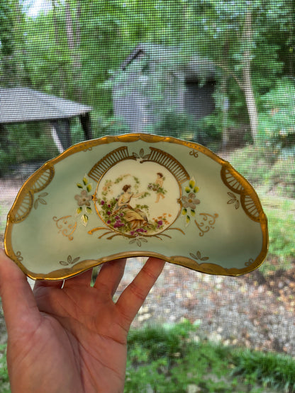 Lovely handpainted crescent dish with gold details!