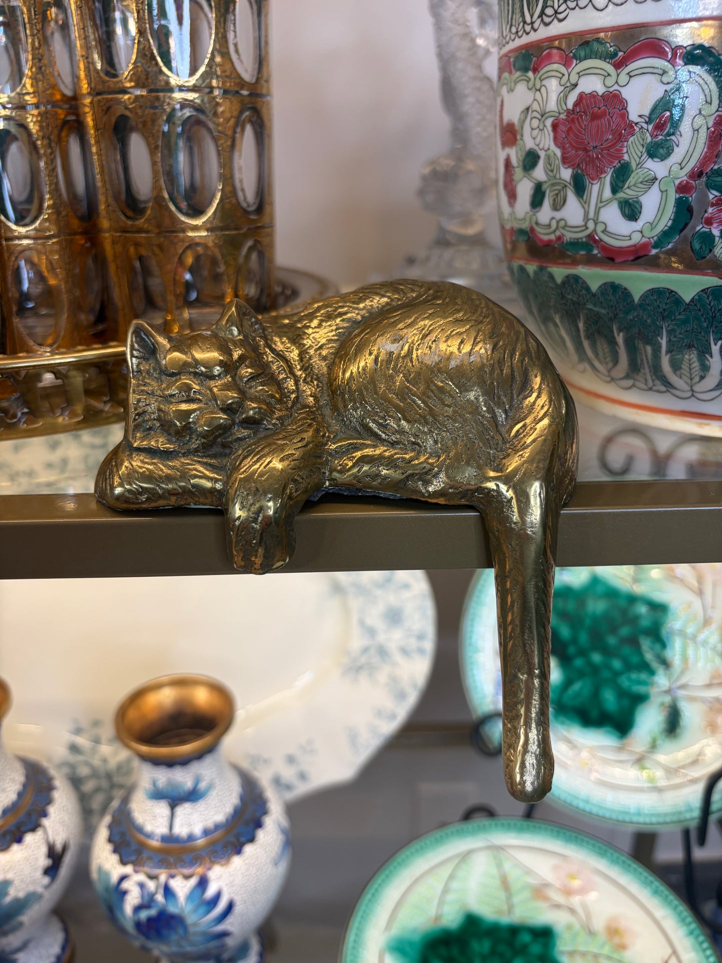 Vintage brass sleeping cat on shelf!