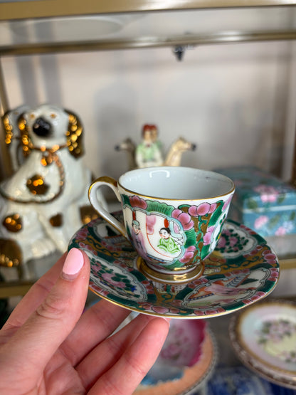 Famille Rose teacup and saucer handpainted featuring birds!