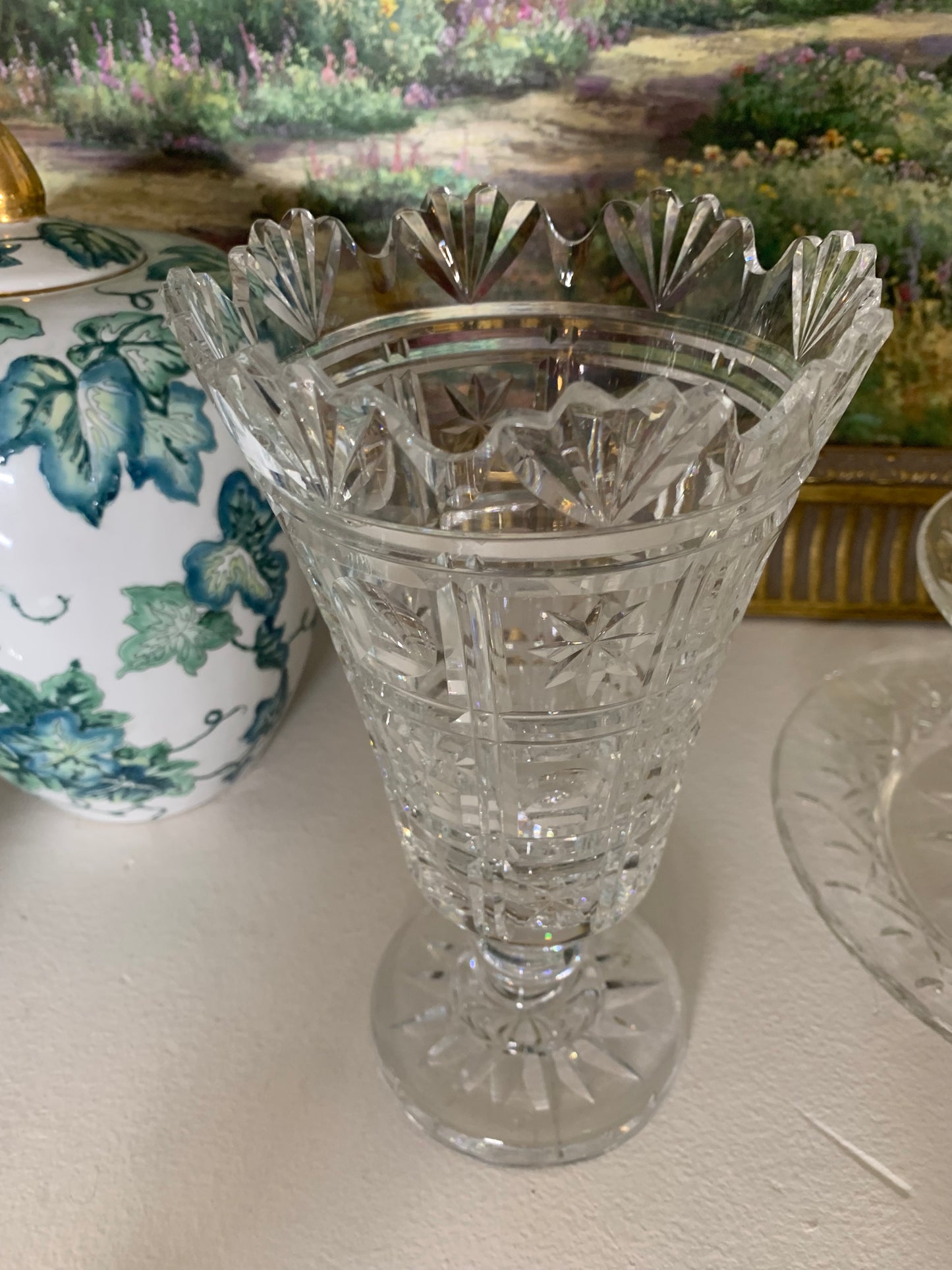 Stunning Waterford crystal footed 10” vase with scalloped rim and intricate cut details!