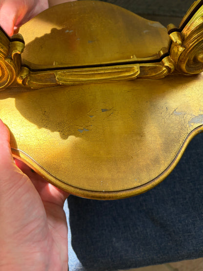 Beautiful Syroco wall mirror with an integrated shelf featuring an ornate gilt gold frame!