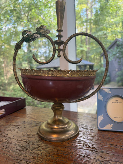 Lovely decorative brass centerpiece bowl or tazza featuring a reddish-maroon enameled body!