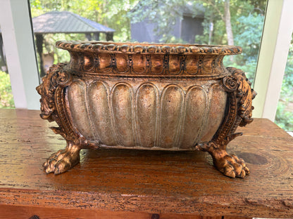 Striking composite lion head and claw feet footbath planter!
