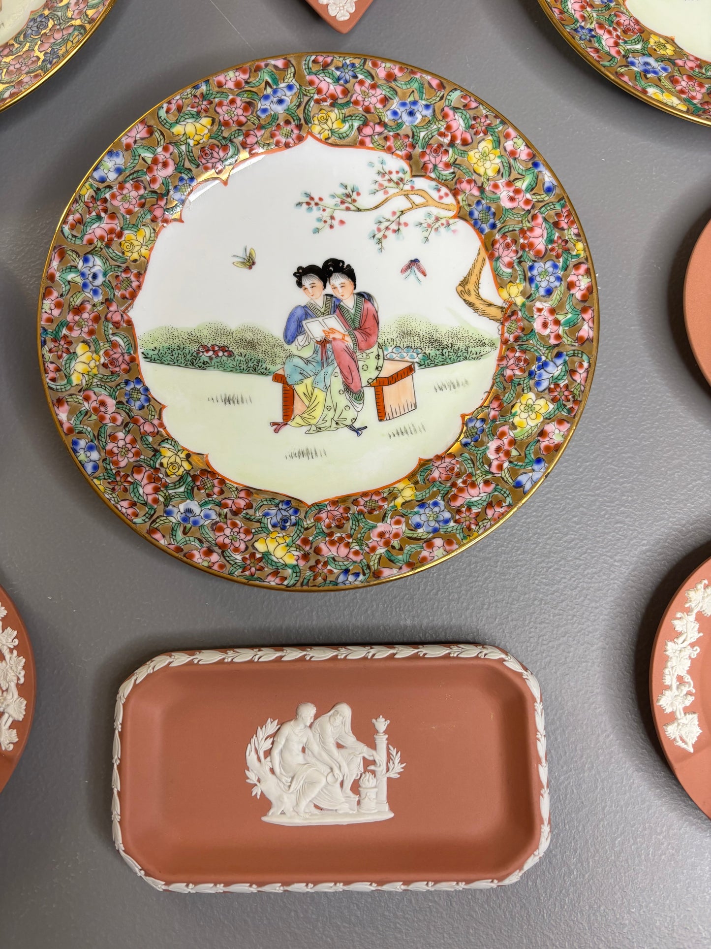 Beautiful instant plate wall! Includes 3 Famille Rose plates and 6 Wedgwood terra cotta dishes!