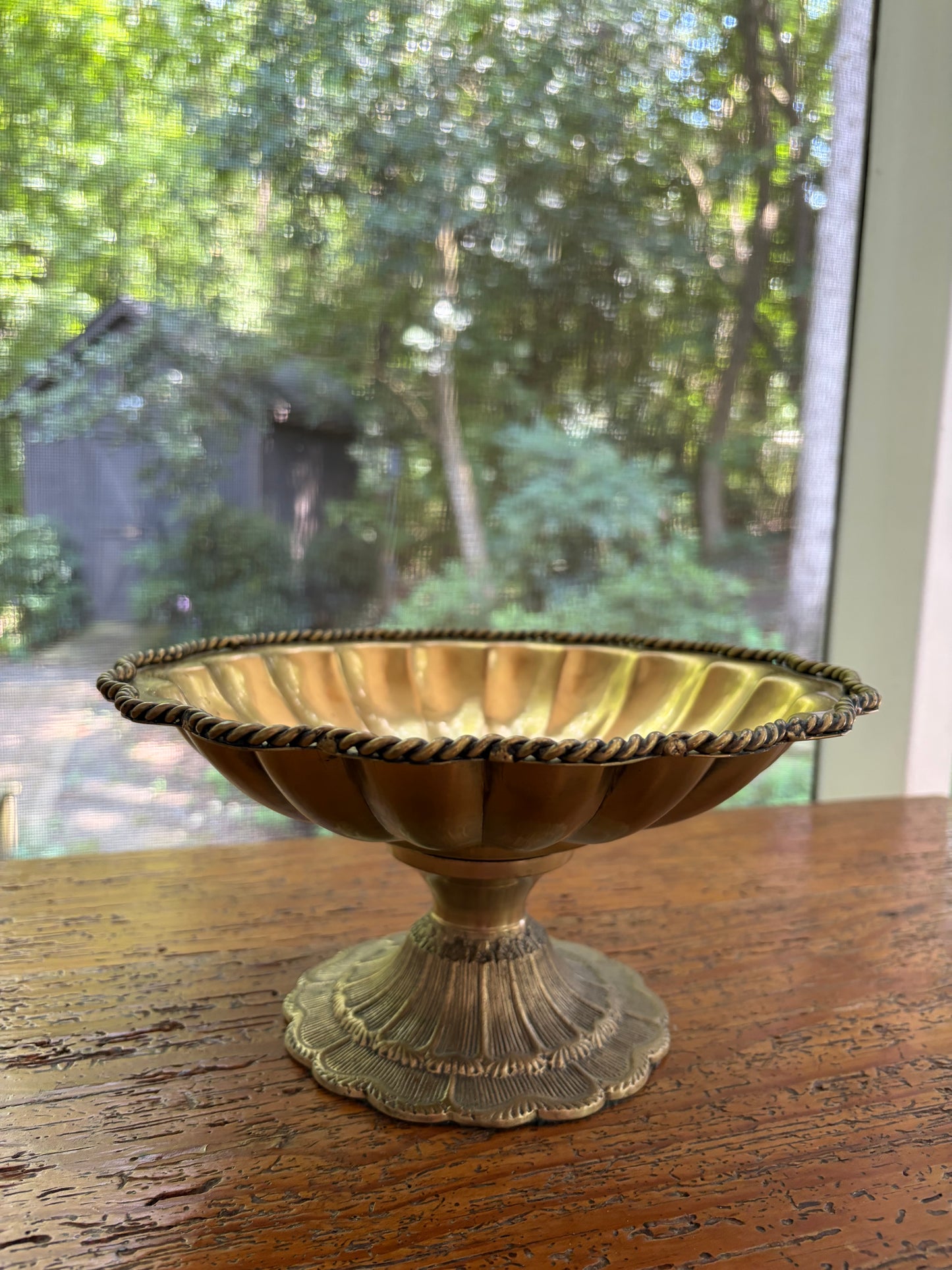 Beautiful brass scalloped pedestal bowl with rope design and intricate base!