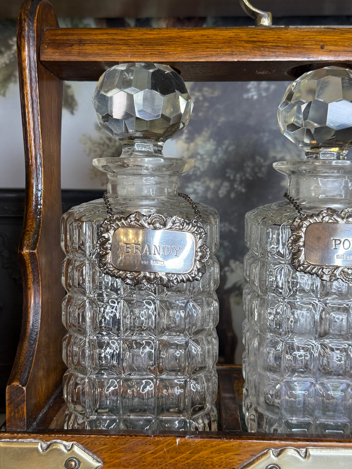 Antique English Oak Three-Bottle Tantalus W/ Cut Crystal Decanters, Sterling Silver Labels & Original Key, c.1900, 15” W x 13” H x 6.5” D
