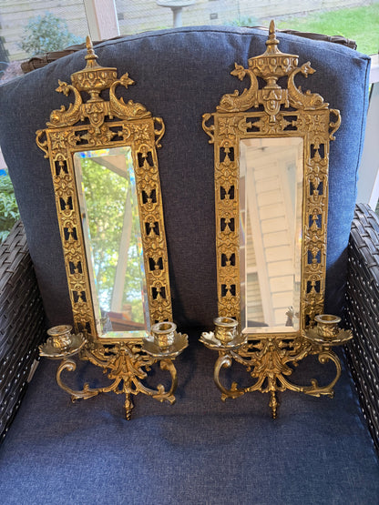 Stunning mirrored brass sconces pair with koi fish, ornate details, and tassel design!