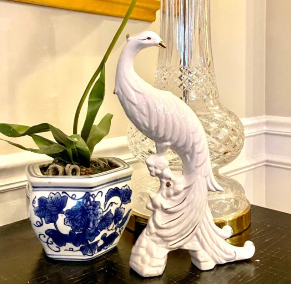 Pristine porcelain vintage tall white statuesque bird.