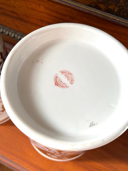 Pair of Antique French Porcelain Apothecary Jars with Portrait Medallions