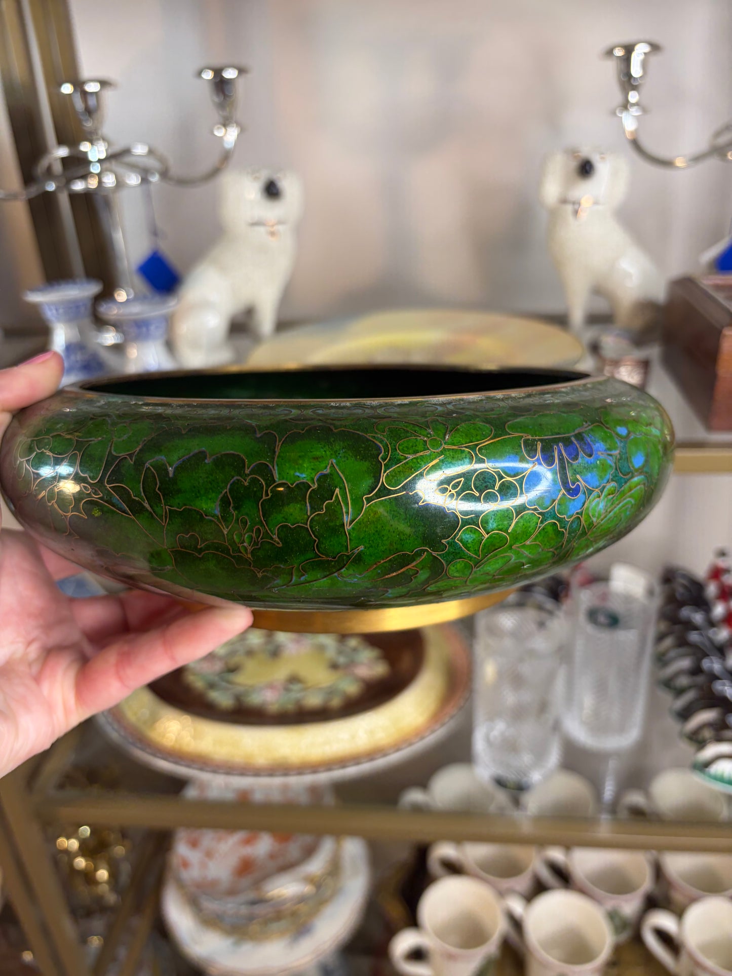 Gorgeous cloisonné green bowl featuring a bouquet and brass rim!