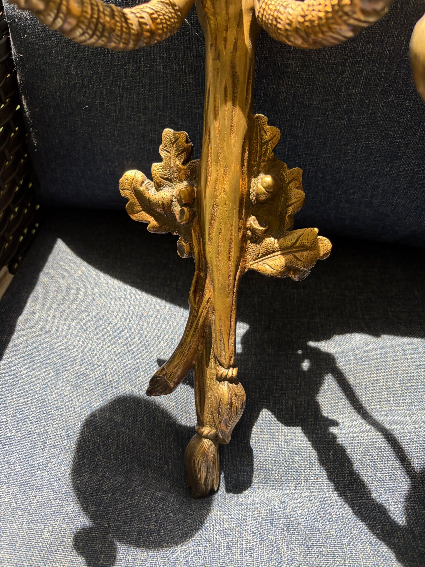 Stunning antique pair of French Louis XVI style brass wall sconces with bows, tassels, and horn motif designs!