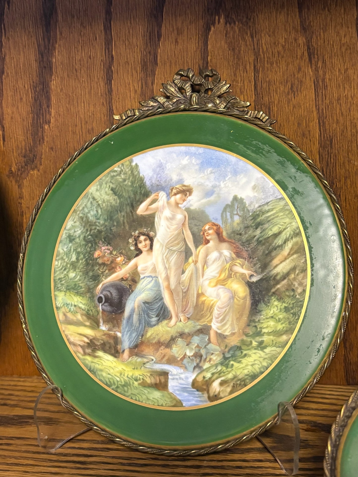 WCCR Charitable Item #159 | Antique Limoges Hand-Painted Round Porcelain Plaque with Ormolu Mount | Three Bathing Maidens | 8" x 9"