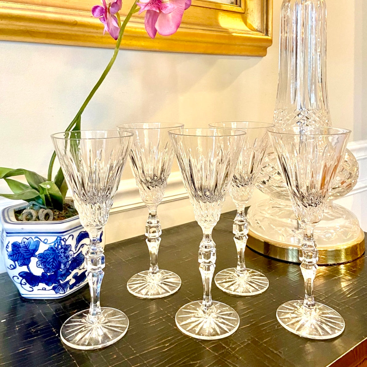 Stunning Set of 5 statuesque crystal wine glasses.